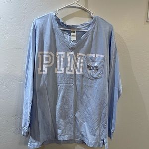 Baby Blue Long Sleeve. Size Small but fits big.